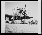 99th Fighter Squadron Members of the ground crew tuning up a plane, this squadron is now taking part in the action in Sicily.