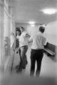 Sergeant Clifford Vasser and Lieutenant Doug Acker booking Anthony Ray Hinton on capital murder charges at the city jail in Bessemer, Alabama.