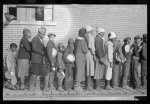 Lined up and waiting for a meal in the camp for Negro flood refugees at Forrest City, Arkansas