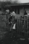 Children in front of World War II-era housing in Marin City, California, circa 1960 [photograph]