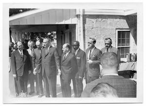 Lyndon Johnson Standing with a Row of Men