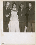 Entertainers Flournoy Miller, Josephine Baker, Noble Sissle and Edgar Battles, from the original New York cast of "Shuffle Along," meeting in Brussels, Belgium, where Sissle was performing a USO Camp Show production of the play for U.S. servicemen, between 1945 and 1946