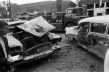 Damaged cars in the street after the bombing of 16th Street Baptist Church in Birmingham, Alabama.