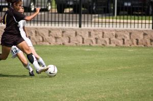 Danielle Herron fighting for the soccer ball