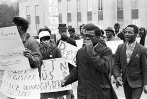 Demonstrators marching toward the Jefferson County Courthouse in downtown Birmingham, Alabama, for a voter registration rally.