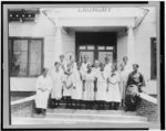 [Group of young African American women on steps of laundry building at the National Training School for Women and Girls, Washington, D.C.]