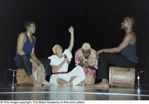 Musicians performing during Ashe Caribbean event