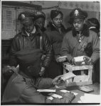 [Black fighter pilot series: "Escape kits" (cyanide) being distributed to fighter pilots at air base in southern Italy, 1945]