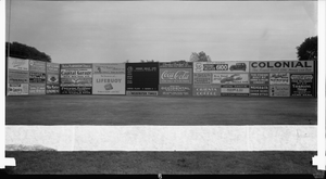 Advertisements and scoreboard on a wall at stadium, probably Griffith Stadium, ca. 1930s : cellulose acetate photonegative, banquet camera format.