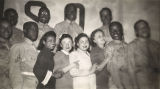 Servicemen and young women at the African American USO club in Anniston, Alabama.