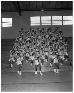 Anderson High School Cheerleaders Standing on Bleachers