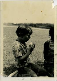 Child Eating a Sandwich