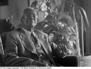 Portrait of Arthur A. Braswell smoking a cigar #2