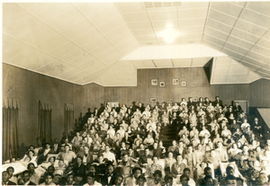 Photograph of patients and staff members watching a moving in the Playhouse at the Georgia Warm Springs Foundation, Warm Springs, Meriwether County, Georgia, 1930-1940?