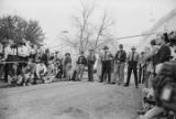 Law enforcement officers standing in front of a fence erected around the Capitol in Montgomery, Alabama, to prevent demonstrators from attempting to remove the Confederate flag from the dome.