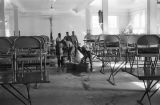 Students mopping the floor of the dining hall at the Alabama Industrial School for Negro Children in Mount Meigs, Alabama.