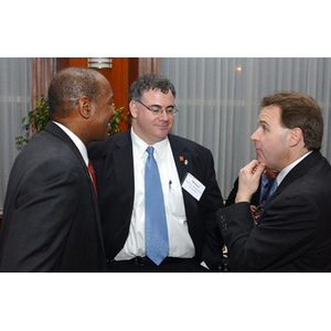 Jim Madigan converses with other guests at The National Council Dinner