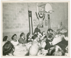 Photograph of a man speaking at an Atlanta Life Insurance Company reception