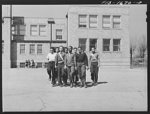 Negro schoolchildren of the Military Officers' Training Corps marching in formation for Chaplain George W. Williams, a graduate of the U.S. Army chaplain school at Fort Benjamin Harrison, Indiana. The MOTC was organized at the school by the teachers for those youngsters who wanted some preparation for future military service