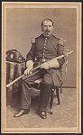 [First Lieutenant Tillinghast L'Hommedieu of 6th Regular Army Infantry Regiment, 1st Regular Army Cavalry Regiment and 3rd Regular Army Cavalry Regiment in uniform with sword and Hardee hat]