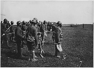 American [African American] troops camp in France. Machine gun instruction.