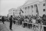 White demonstrators in front of the Industrial Relations Building on Monroe Street in Montgomery, Alabama, protesting an attempt to remove the Confederate flag from the Capitol dome.