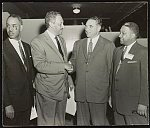 [Thurgood Marshall shaking hands with George Christopher, the mayor of San Francisco, as Roy Wilkins and R.J. Reynolds look on at 47th annual NAACP convention in San Francisco, June 26-July 1]