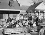 Children on a Mardi Gras float in an African American neighborhood in Mobile, Alabama.