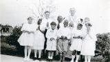 Group Portrait of First Communion Group with Rev. Rebesher, S.S.J., Our Mother of Mercy Chapel, Belvedere, Delaware, 1933