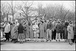 [Cowds of people along the street, outside Warren County High School, Front Royal, Virginia, during school integration]