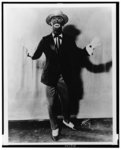 [Eddie Cantor, full-length portrait, in blackface and costume, standing, facing front]