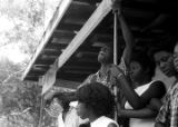 Edward Rudolph and others, standing on the porch of the Autauga County Improvement Association office in Prattville, Alabama, on the day of a civil rights march.