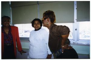 Three Women Near Windows