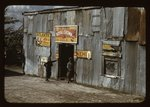 Negro migratory workers by a "juke joint" (?), Belle Glade, Fla.