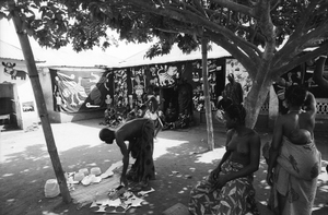 Appliqué workers, in street, Abomey, Benin