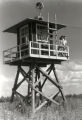 Young People Looking Out from Watch Tower at Jerome Relocation Center