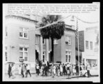 Negroes protesting the hearing of 11 "Freedom Riders" here 12/12 march around the City Hall, singing hymns and shouting their desire for "freedom"