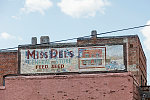 Old and faded advertising sign in Clarksdale, a prominent home to old-time blues music in the Mississippi (River) Delta region in Northwest Mississippi