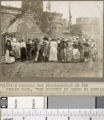 Population reading the proclamation on the church door, 'The country is ceded to America,' Pageant of St. Louis