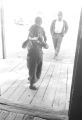 Young son and daughter of John Nixon, on the front porch of their home in Autaugaville, Alabama.