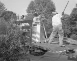 Unloading new bells for the Church of the Ascension at 315 Clanton Avenue in Montgomery, Alabama.