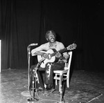 Man performs on stage, Los Angeles, 1972