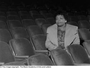 Dr. Versia Lacy seated in empty auditorium #4