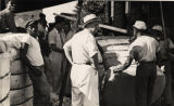 Weighing cotton at Dean & Moore Cotton Warehouse in Eufaula, Alabama.