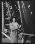 Production. Launching of the SS Booker T. Washington. Marian Anderson, celebrated contralto, prepares to christen the SS Booker T. Washington, talks to two Negro workmen who helped construct the first Liberty Ship named for a Negro, at the Wilmington yards of the California Shipbuilding Corporation