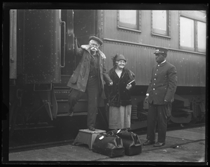 Thumbnail for Mellie and Gram Dunham disembarking from a train