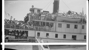 Sept[ember] 3, 1933 [group of people aboard the excursion ship E. Madison Hall alongside a jetty : cellulose acetate photonegative, banquet camera format]