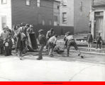 Children cleaning neighborhood street