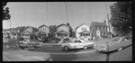 [Cars pass homes in an African American neighborhood, South Dakota Avenue, N.E., Washington, D.C.]