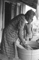 Good Negatives: Centreville, Miss. Chapman Home, house interior, Don Stuart, Strawberry Roberson. Children with wagon and mules, mules plowing, woman hoeing (GNP C-68 #594)